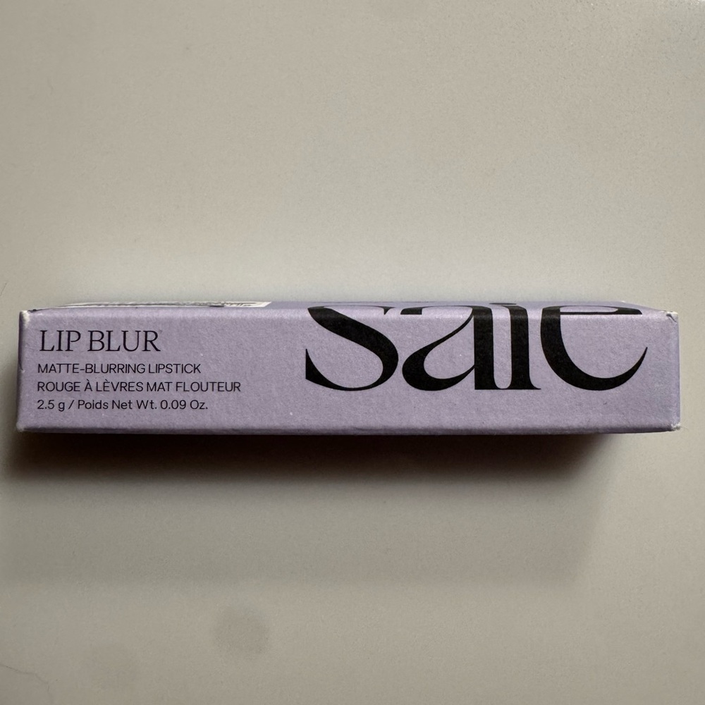 Saje Surreal Lipstick in Red and Gray
